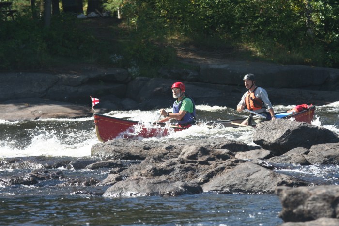 Jim paddles from one shore